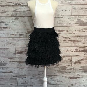 Black feather skirt.